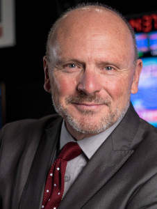 Dean Mintle is photographed for new portraits and head shots at the LFSN Vines Center Control Room on January 15, 2015. (Photo by Kevin Manguiob)